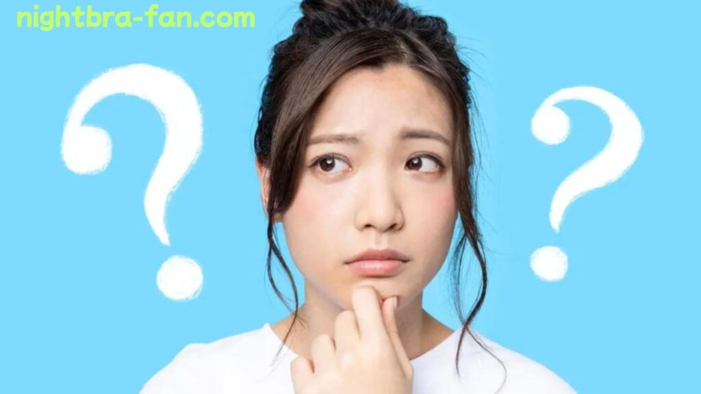 悩んでいる女性の画像